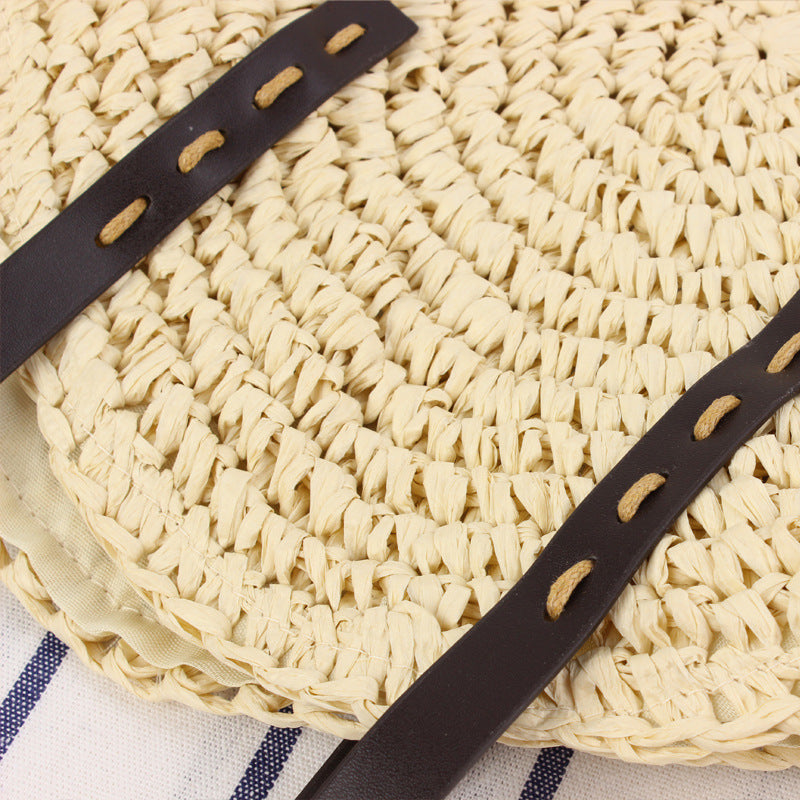 Round basket bag with sturdy leather handles Skanto