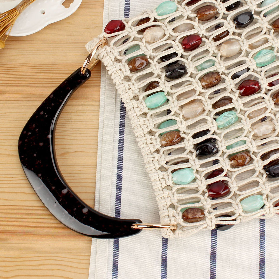 Handbag with colorful jewelry element Skanto