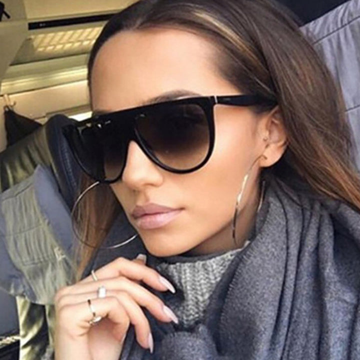 Dame trendy oversized solbriller med stilige transparente rammer Skanto