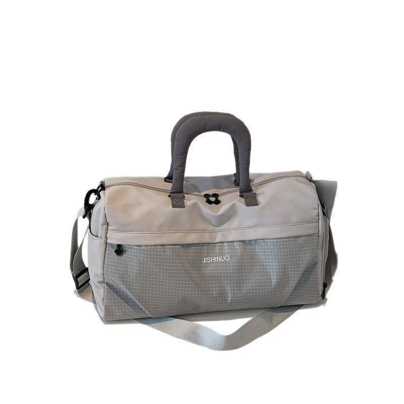 Sporty fritids-duffelbag med ergonomiske håndtak og flere rom Skanto