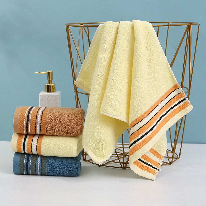 Premium terry towel with elegant stripe border.
