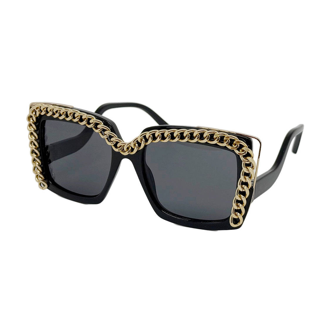 Dame moteriktig oversized solbrille med kjederamme Skanto