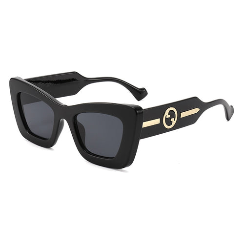 Dame designer solbrille med markant geometrisk ramme og høy kvalitet utførelse Skanto