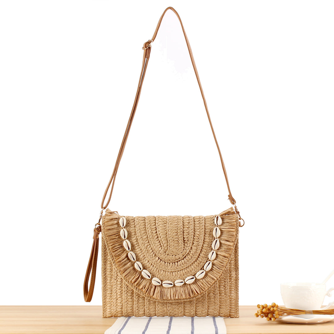 Shoulder bag with hand-knotted shell decor Skanto