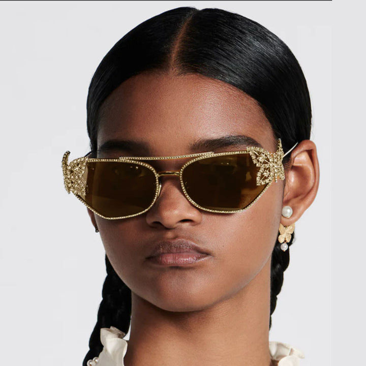 Dame luksus solbrille med elegant sommerfugl-detalj Skanto