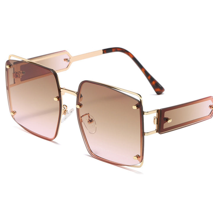 Damer elegante oversized solbriller med markant geometrisk design Skanto
