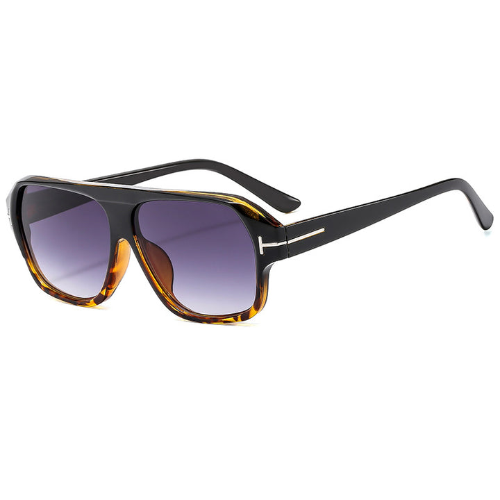 Dame modische solbrille med markant geometri og brune glass Skanto