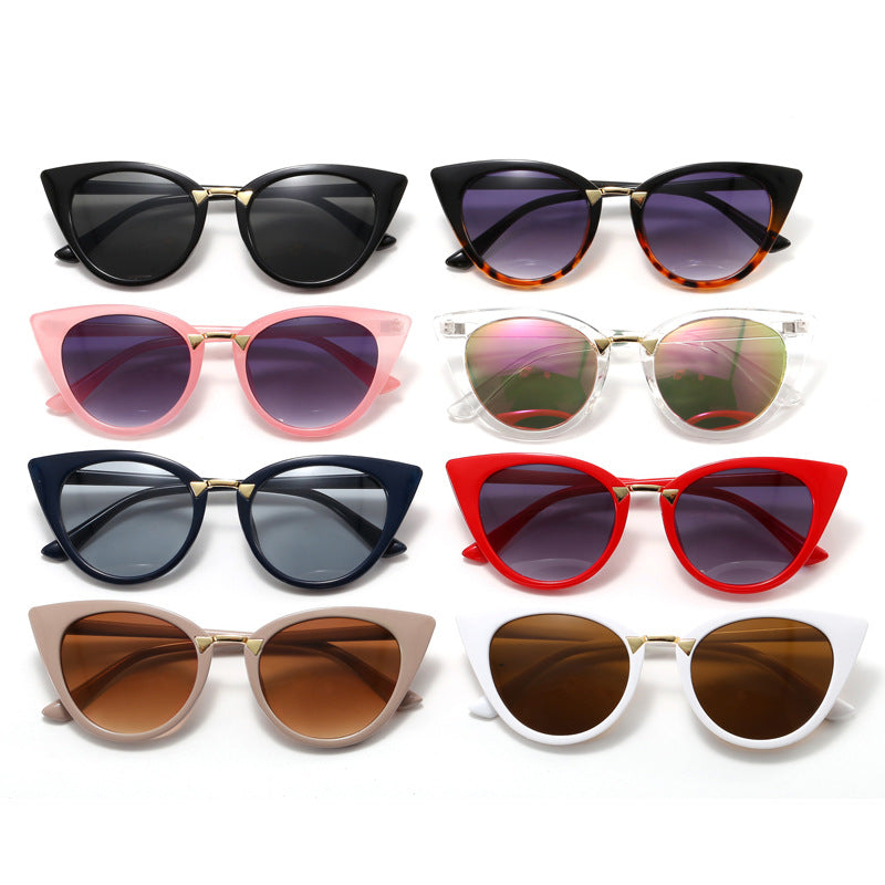 Dame Cat-Eye solbrille med elegant gull detaljer Skanto