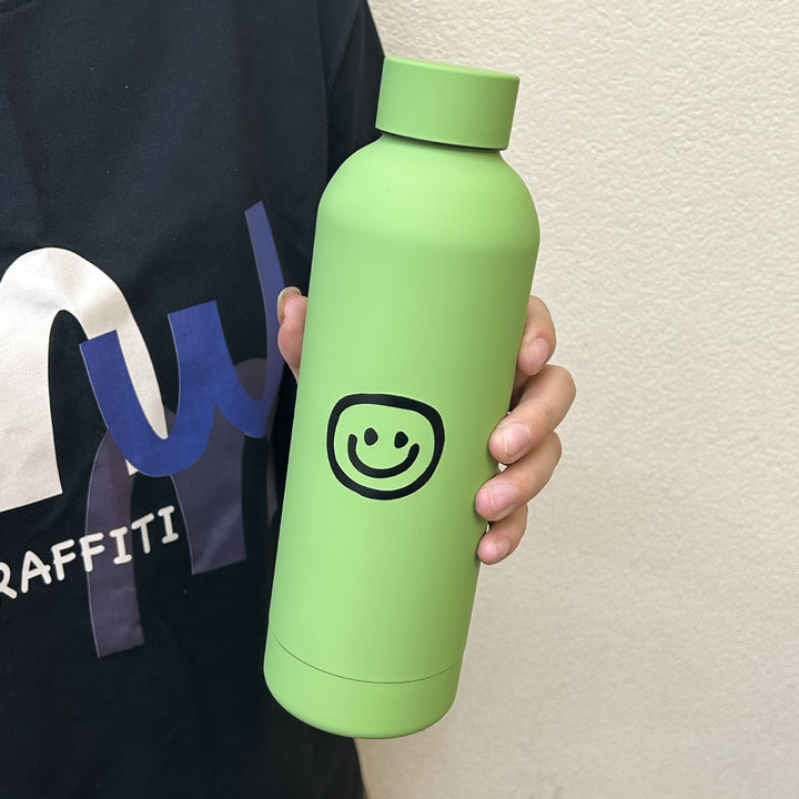 Damen Isoliertrinkflaske med lyst smilmotiv Skanto