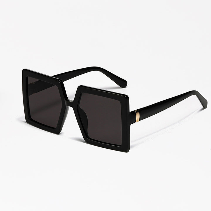 Dame geometrisk solbrille med moderne, bred ramme Skanto