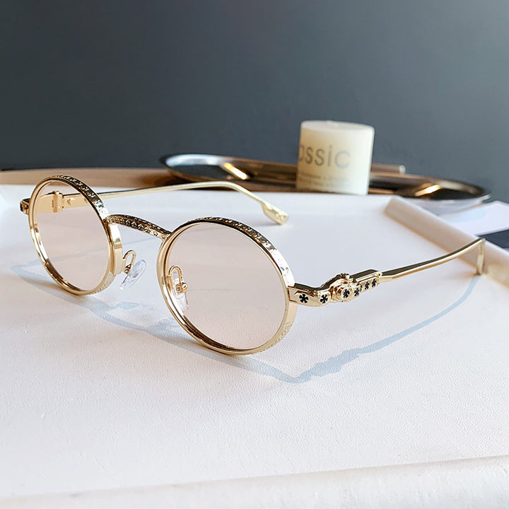 Dame Elegant solbrille med filigran detaljer Skanto
