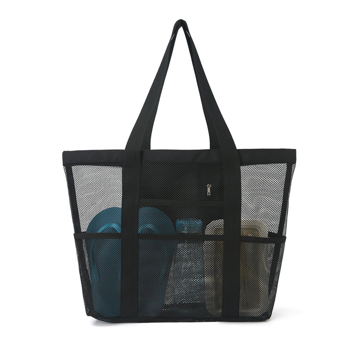 Praktisk strandveske med nettdesign Skanto