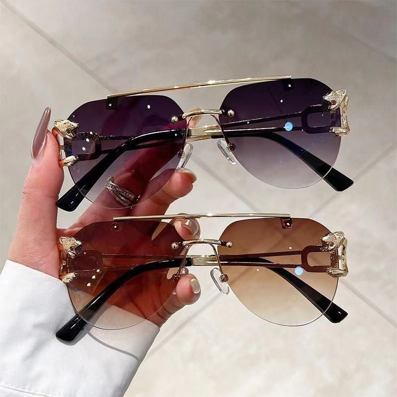 Dame Designer solbrille med unikt dyreakcent Skanto