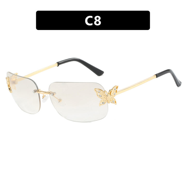 Dame moteriktig solbrille med filigran sommerfugldesign og beskyttende glass Skanto