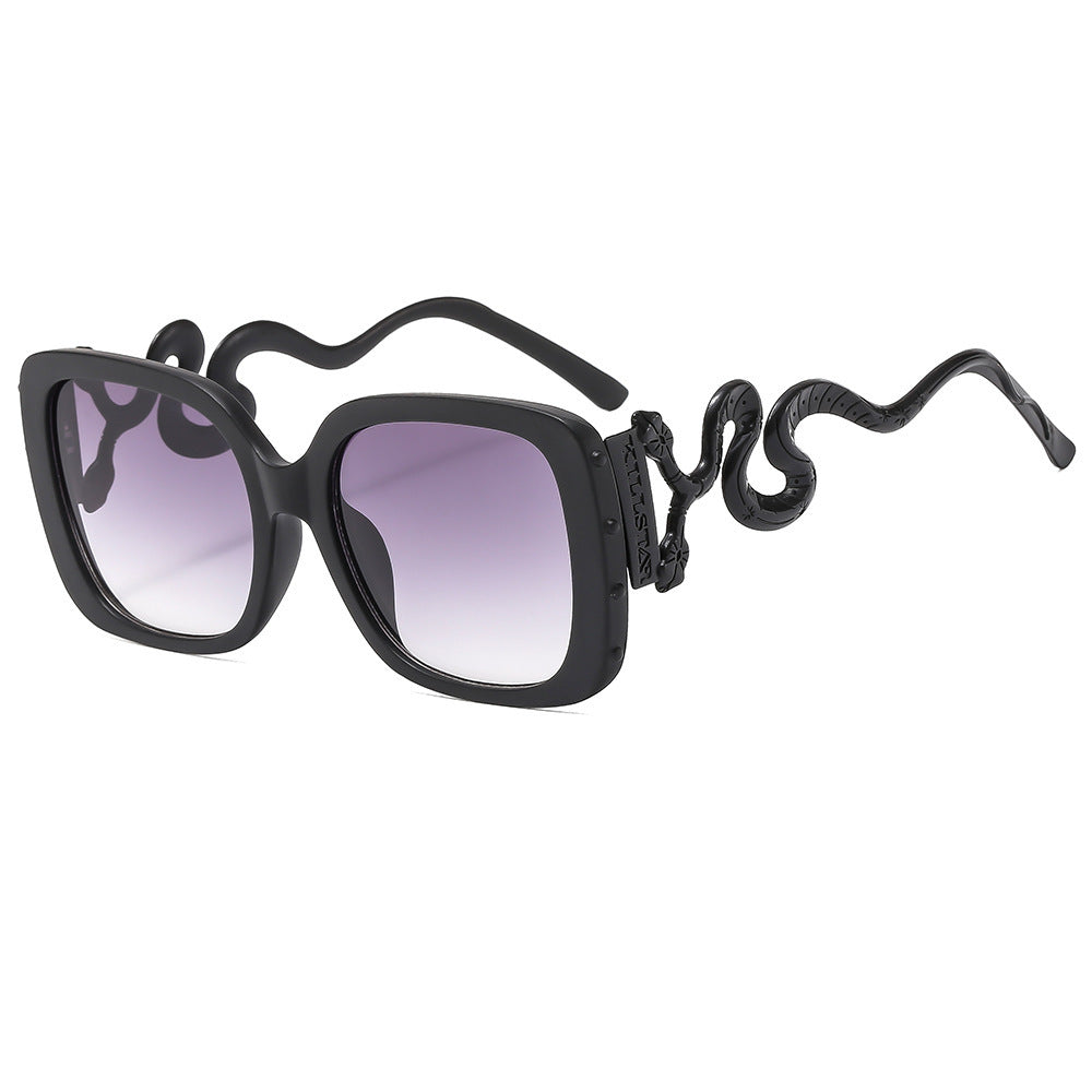 Dame ekstravagant designer solbrille med luksuriøs slangeramme Skanto