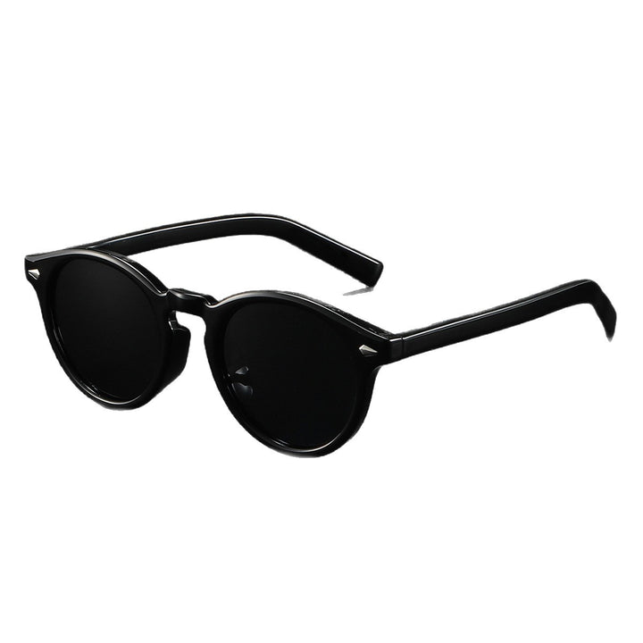 Dame Rund-solbrille med transparent ramme og reflekterende glass Skanto