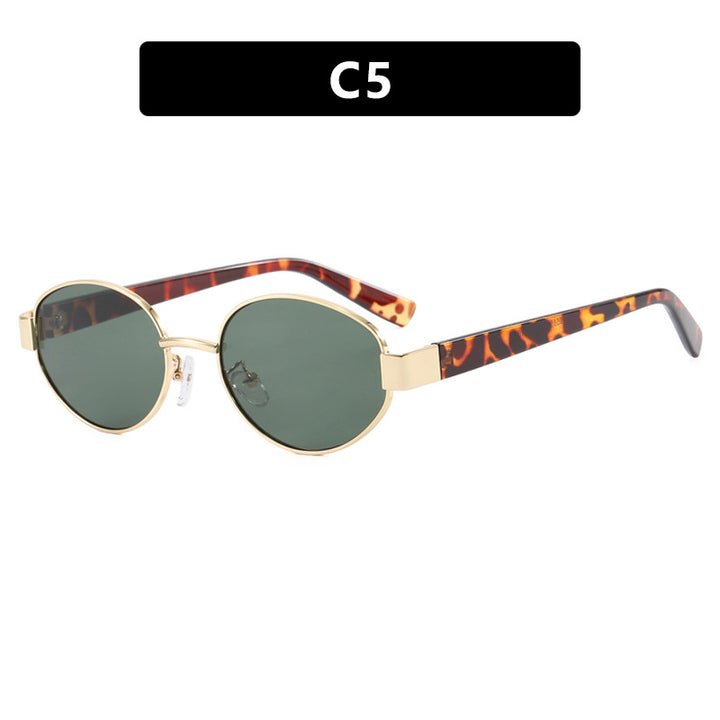 Dame fashionable solbriller med eksklusivt leopardmønster og elegant metallramme Skanto