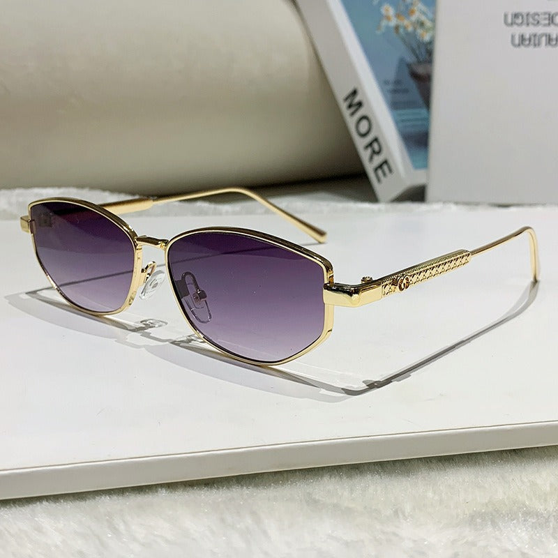 Dame elegant solbrille med glitrende metallramme Skanto