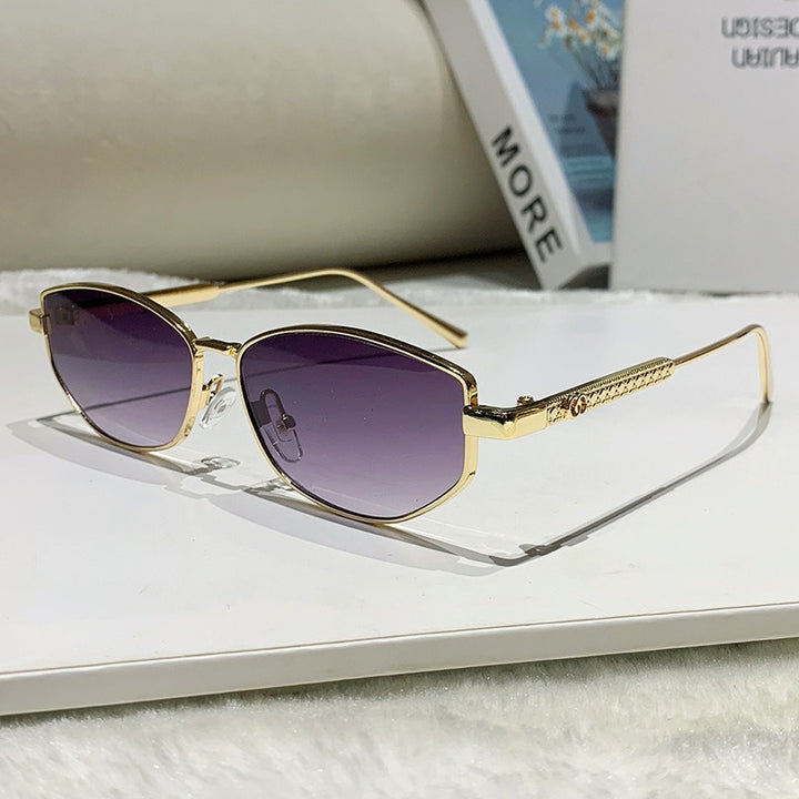 Dame elegant solbrille med glitrende metallramme Skanto