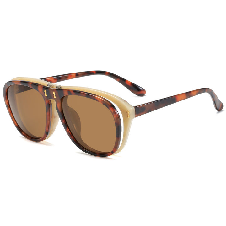 Dame moderne oversized solbrille med unik skjelldesign Skanto