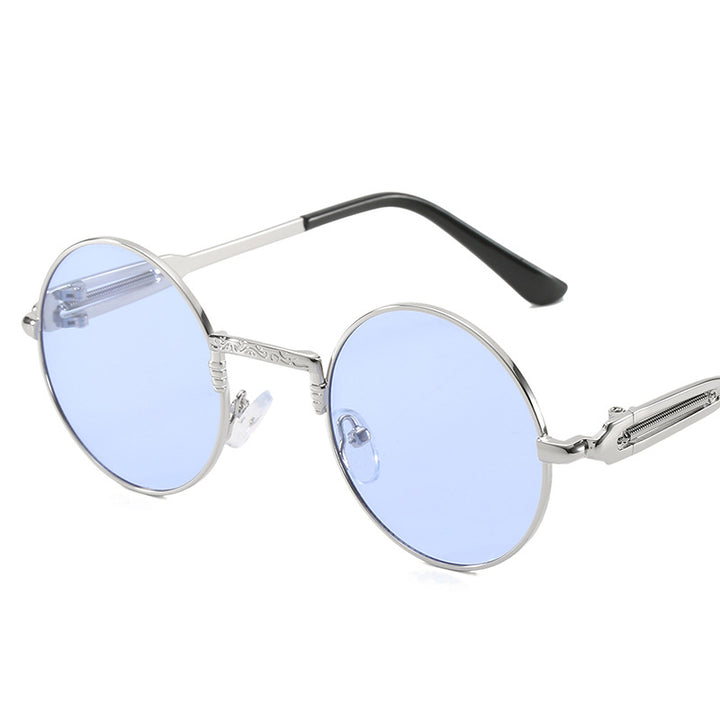 Dame rund modisk solbrille med fint metallramme Skanto