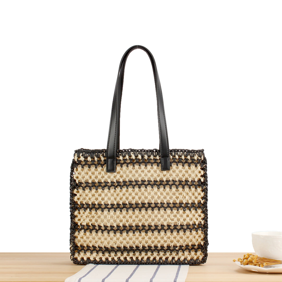 Handbag with durable braided design and elegant leather handles Skanto