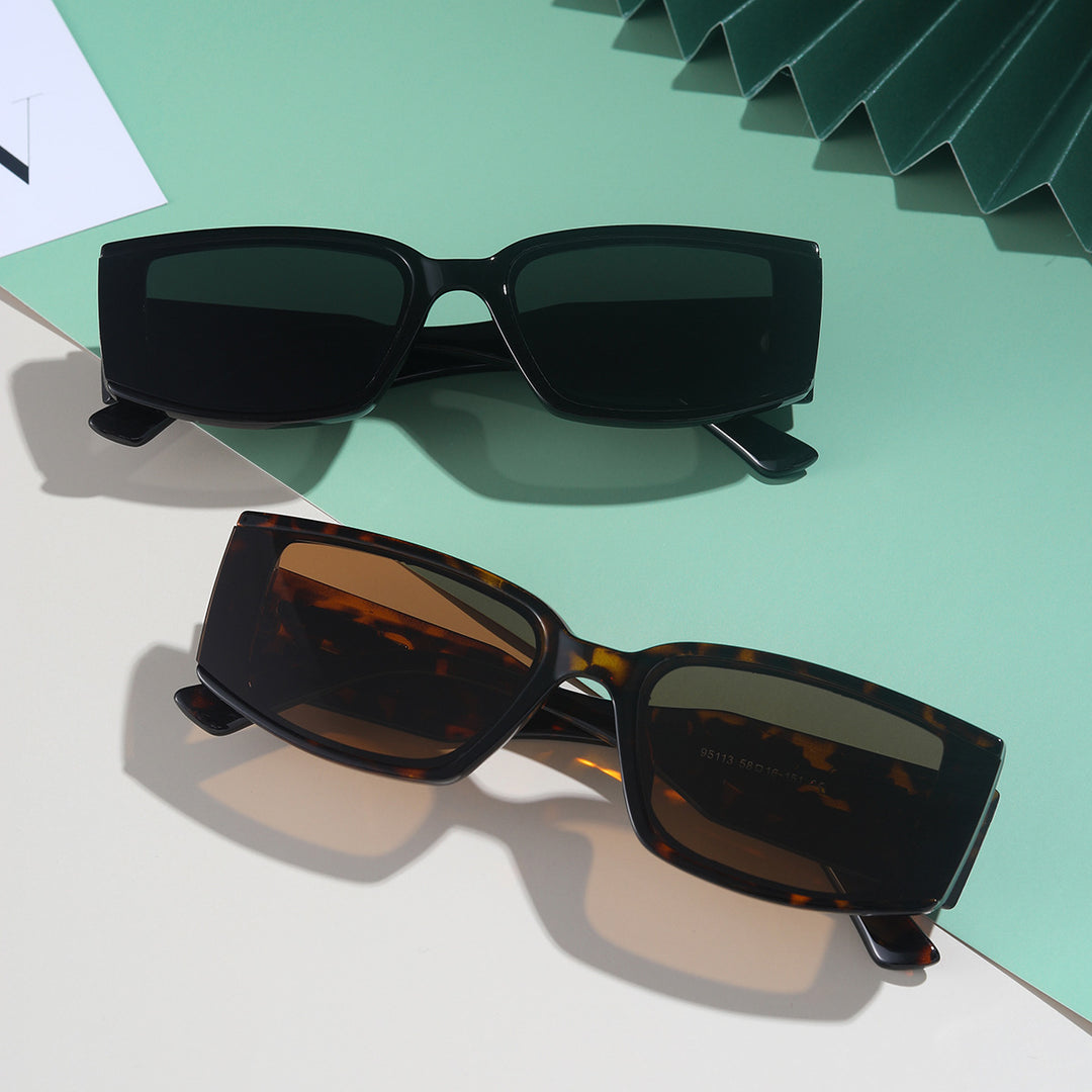 Damer elegant rektangulær solbrille med stilig acetatinnramming Skanto
