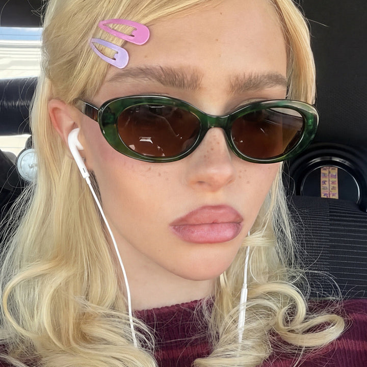 Dame moter Cat-Eye solbriller med UV-beskyttelse og elegant ramme Skanto