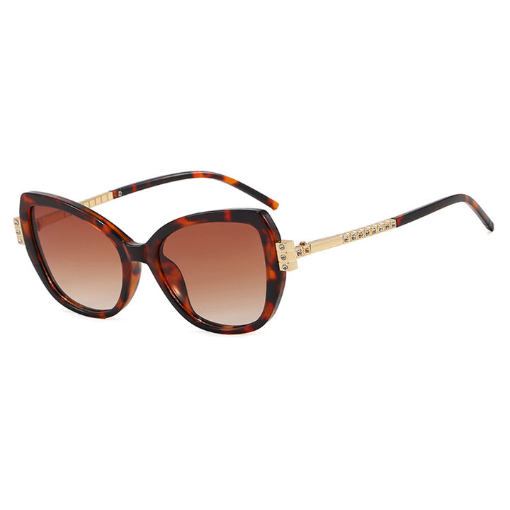 Dame oversized solbrille med beskyttende UV-filter og elegante aksenter Skanto
