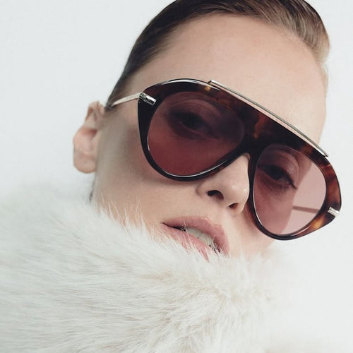 Dame solbrille i elegant heksagon-design Skanto