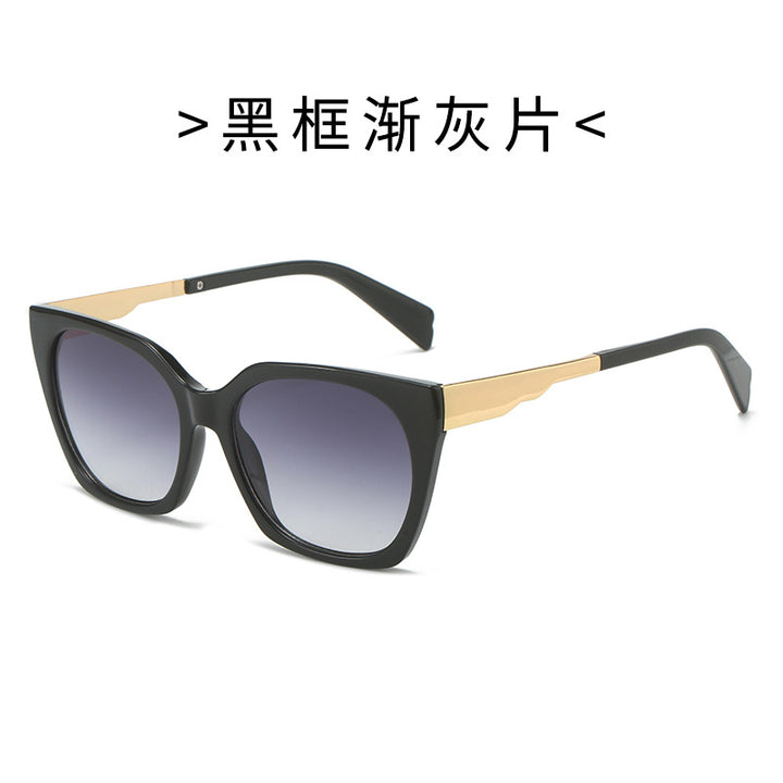 Dame Oversized-solbriller med elegant transparent ramme og gyldne aksenter Skanto