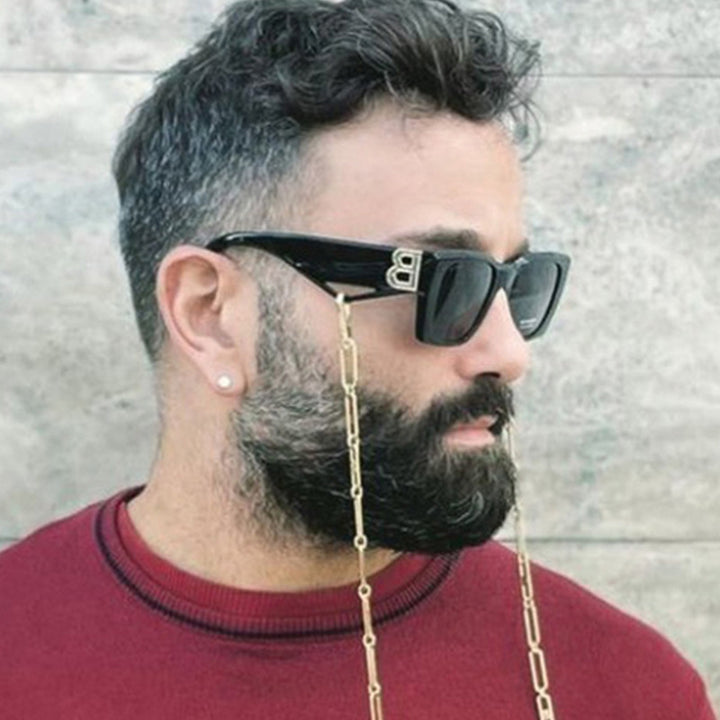 Dame moteriktig geometrisk solbrille med unike designelementer Skanto