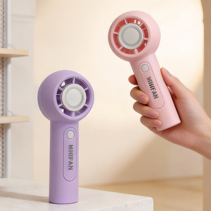 Dames bærbar mini håndvifte med ergonomisk design og USB-tilkobling Skanto