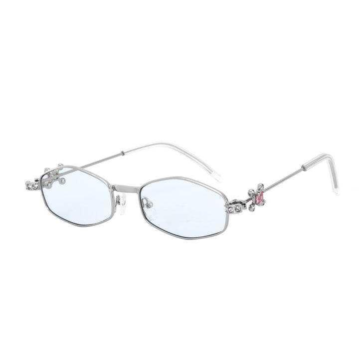 Dame Designer-solbrille med elegant smykkeinnramming Skanto
