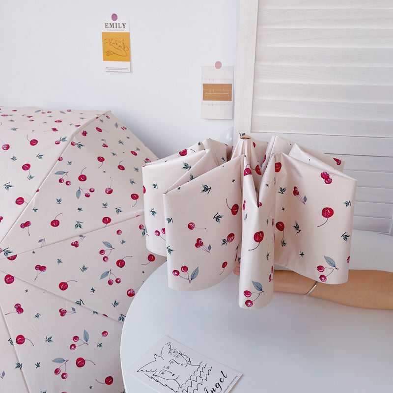 Dame sammenleggbart paraply med elegant hjerte-design Skanto