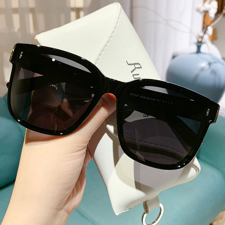 Dame Fashionable solbriller i trendy kvadratisk design Skanto