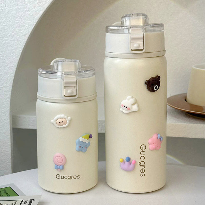 Dame isolerende drikkeflaske med sikker klaffelokk og leken design Skanto