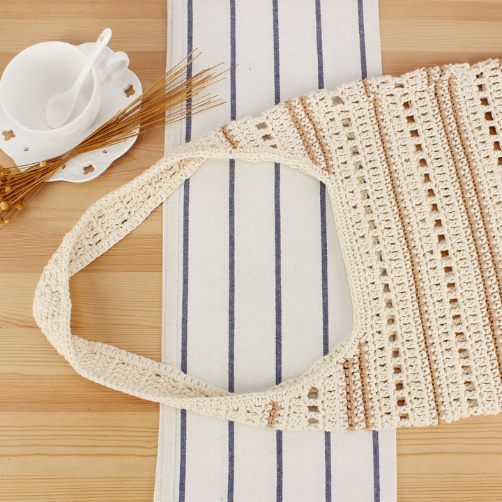 Hand-knotted shoulder bag with maritime stripe pattern Skanto