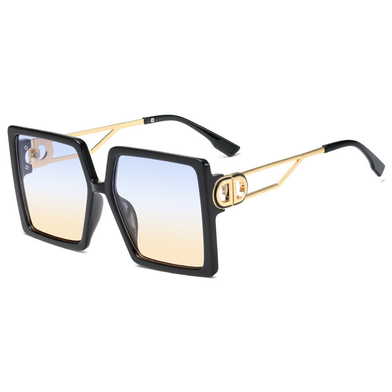 Dame oversized firkantet solbrille med elegant metallramme og polariserte glass Skanto