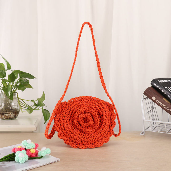 Håndlaget skulderveske med unikt blomsterdesign Skanto