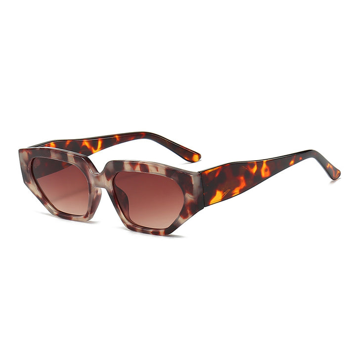 Dame Modisk solbrille i innovativ polygonal design Skanto