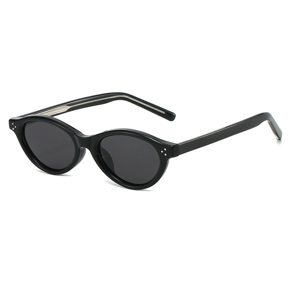 Dame Cat-Eye solbriller med elegant, transparent ramme og UV400-beskyttelse Skanto