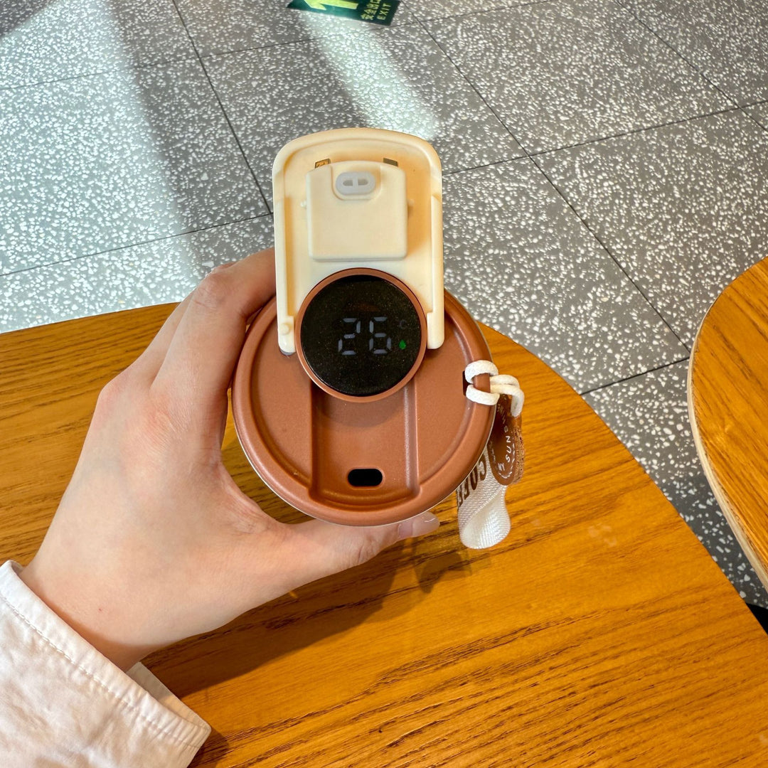 Dame isolert kaffekopp med praktisk håndholdtsløyfe Skanto