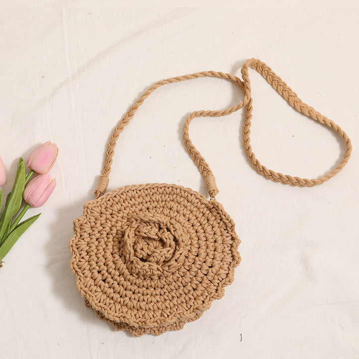 Håndheklede crossover-veske med florale detaljer Skanto