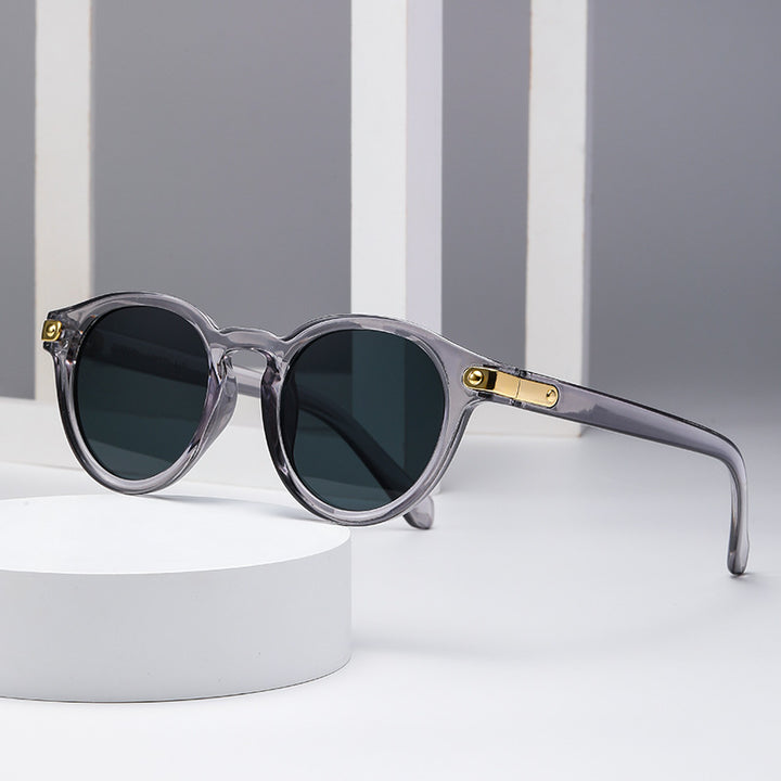 Dame moteriktig solbrille med transparent ramme og robuste glass Skanto
