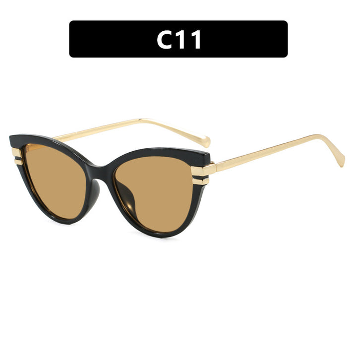 Dame Cat-Eye solbriller med elegant plastramme og gullaccentuer Skanto