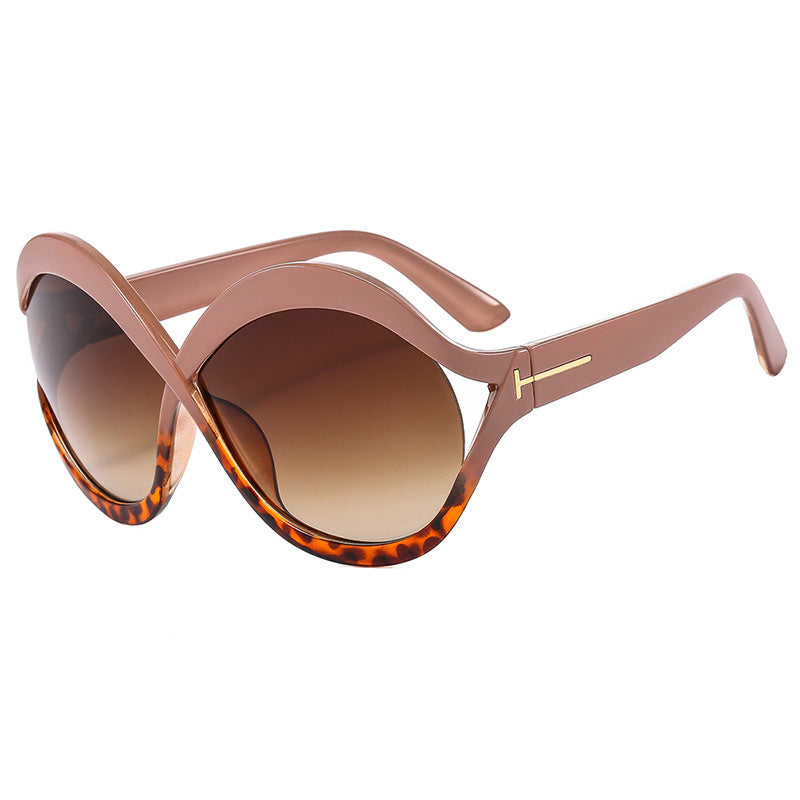 Dame ekstravagant formet solbrille Skanto
