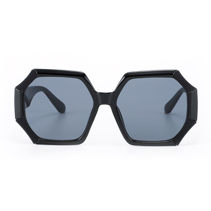 Dame moterelatert solbrille med fasettert ramme Skanto