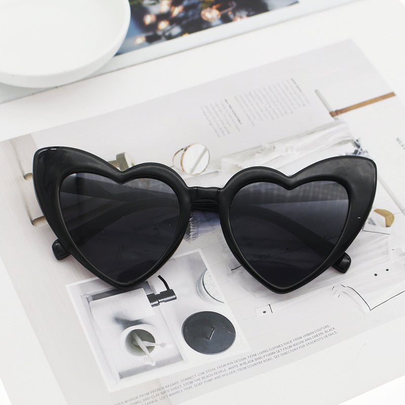 Dame hjerteformet solbrille med glitrende ramme Skanto