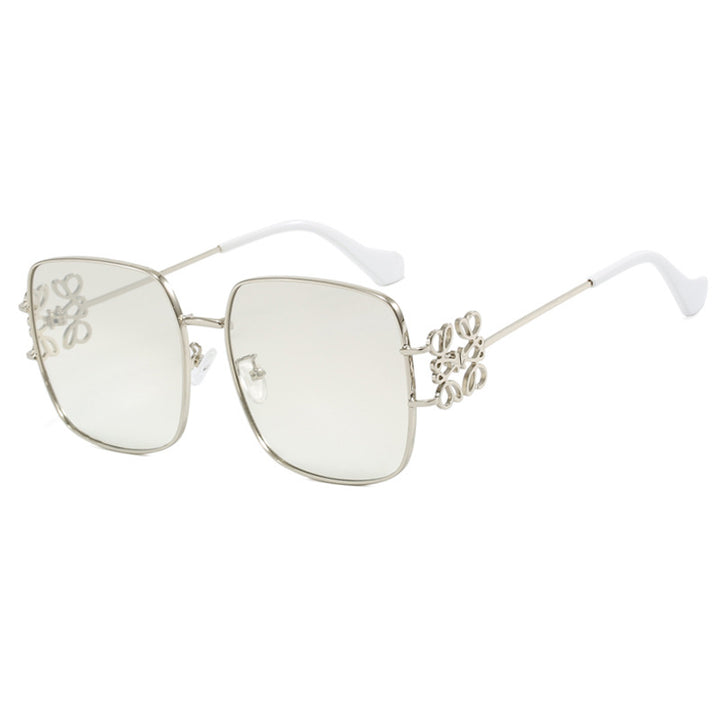 Dame kvadratisk solbrille med filigran design og luksuriøs metallramme Skanto